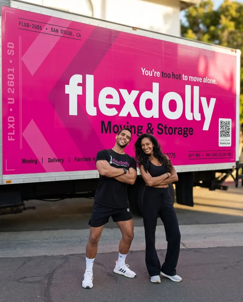 Two Flexdolly crew members standing in front of the pink San Diego truck