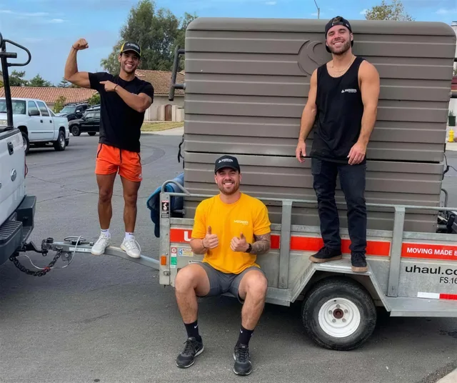 Flexdolly crew moving a cold plunge on a trailer