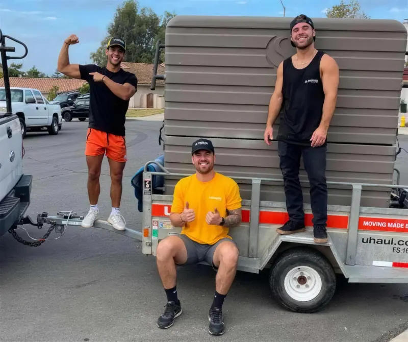 Flexdolly crew moving a cold plunge on a trailer