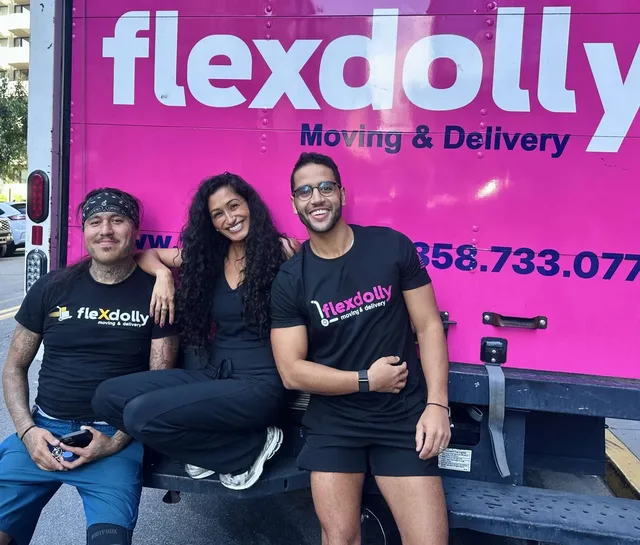 Flexdolly crew at the truck tailgate between jobs